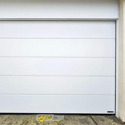 Installation d’une porte de garage Hormann Renomatic 